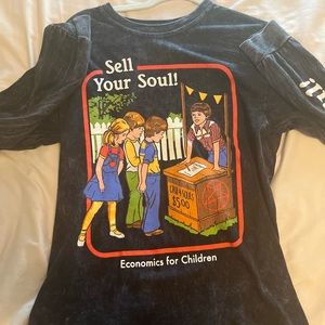 Sell your soul sweater. We all see these in Spencer’s